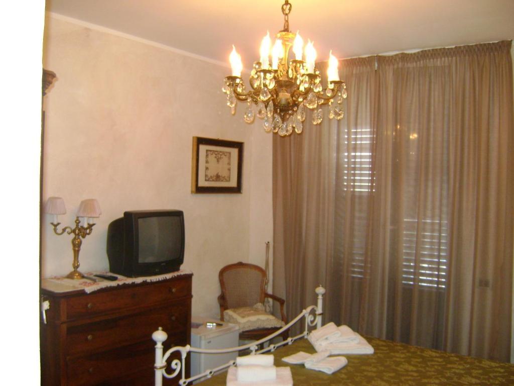 Hotel La Petite Maison Виареджо Стая снимка